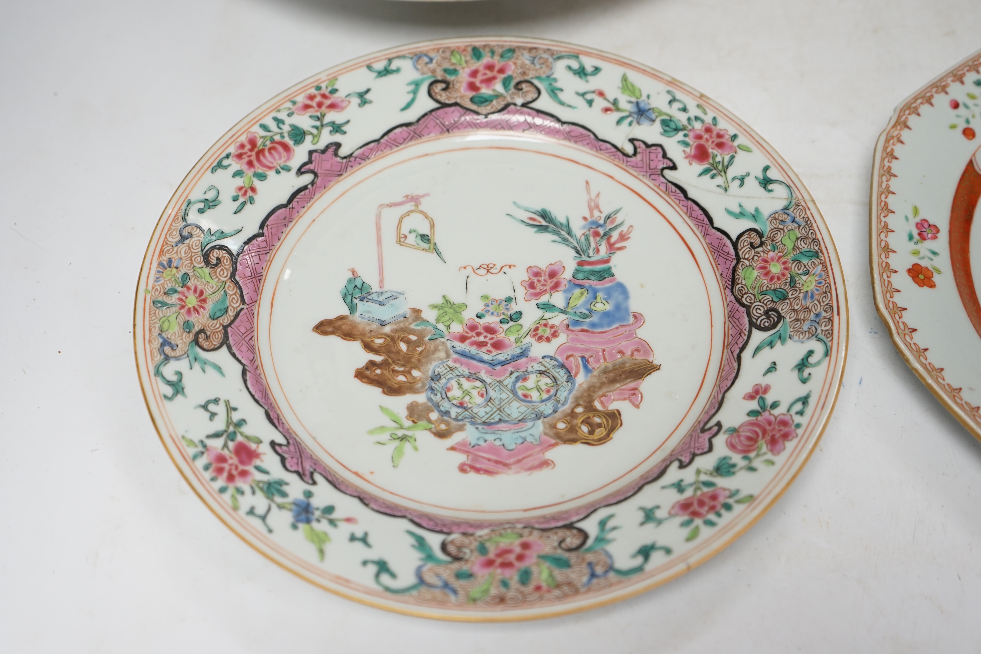 A pair of Chinese famille rose octagonal dishes, one other similar and a Cantonese dish, 18th/19th century, largest 29.5cm (4). Condition - circular famille rose dish with a restored area